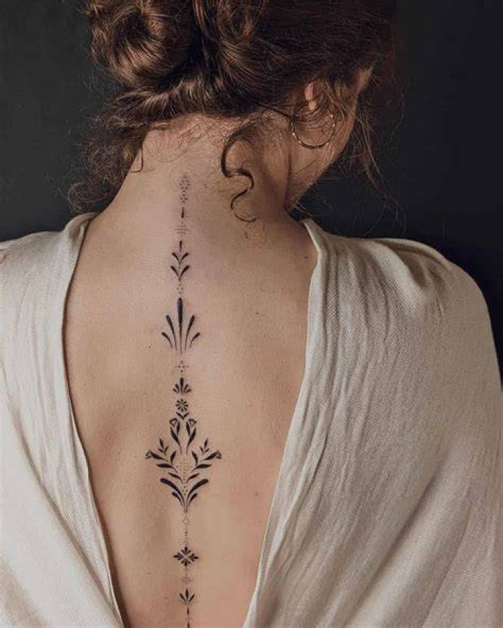 23 Spine Tattoos for Women in 2022 Small Tattoos & Ideas