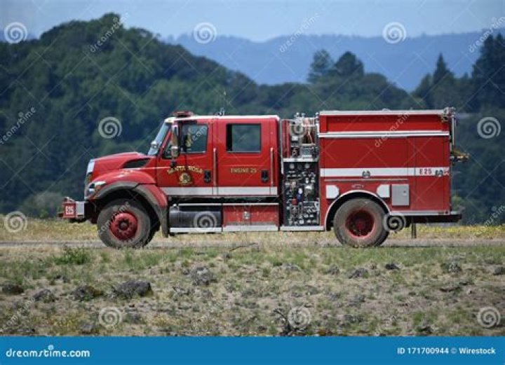 a fire truck parked in front of a building