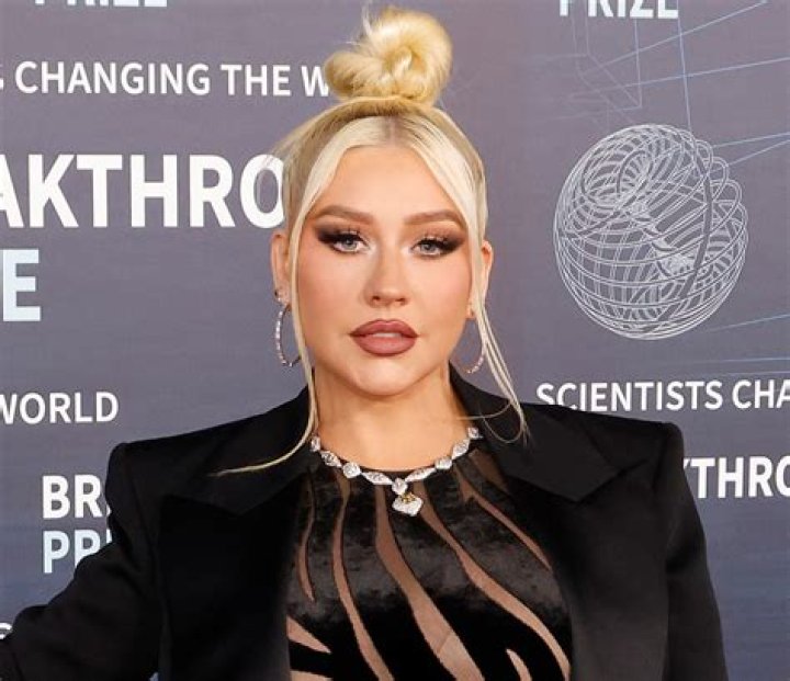 Christina Aguilera In Bathing Suit Is 'Feeling' Love Sqandal