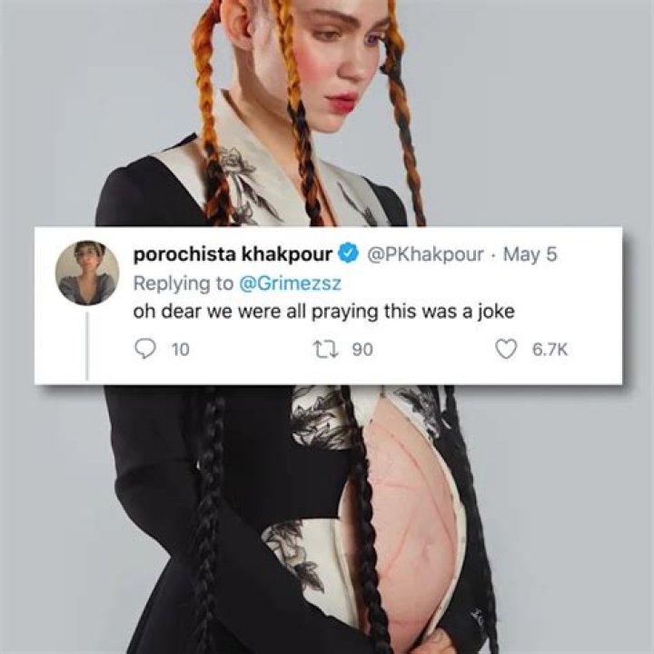 Elon Musk and Grimes share first photo of their baby covered in tattoos