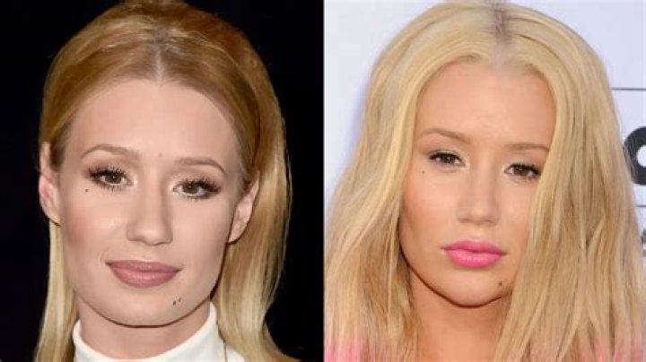 Iggy Azalea makes a rare appearance with clothes on in stylish red