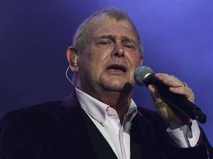 John Farnham is awake and stable in ICU after surgery