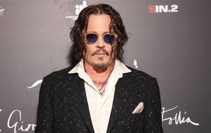 Johnny Depp's exwife drops defamation suit vs. Doug Stanhope