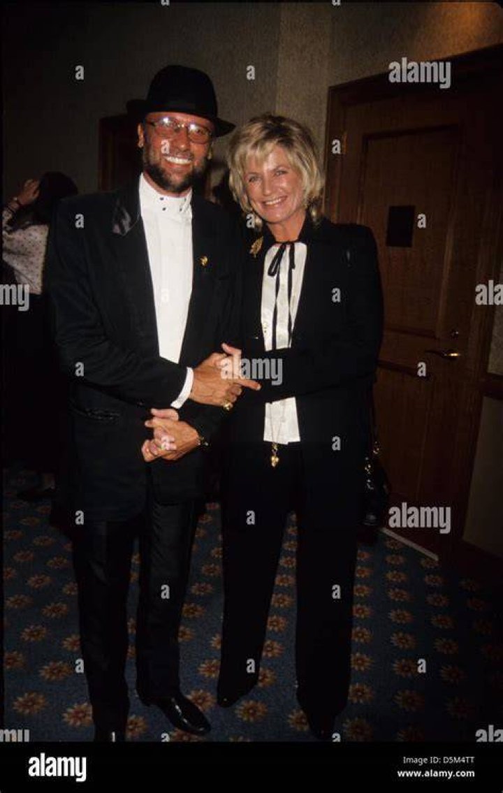 MAURICE GIBB with wife Yvonne Spenceley and children Adam Gibb and