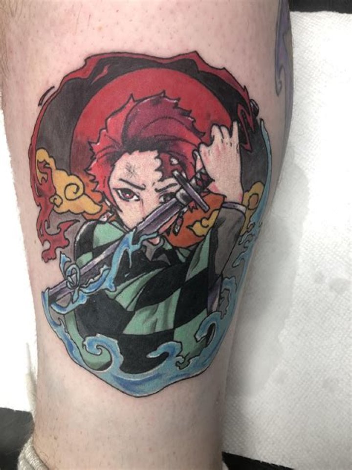 New Demon Slayer tattoo done by Logan Mcgibbony at Envisions Ink in