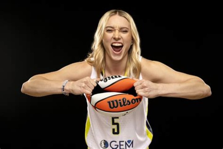 Rion Paige in white Photo Peavey CFM News