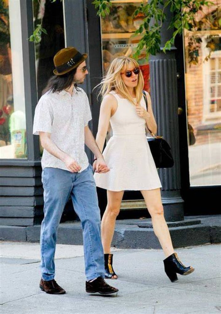 Sienna Miller with her fiance Tom Sturridge and daughter Marlowe