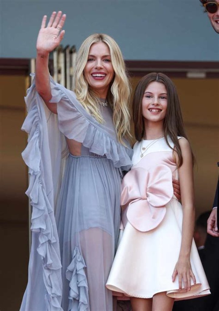 Tom Sturridge carried his daughter, Marlowe, in his arms when he took