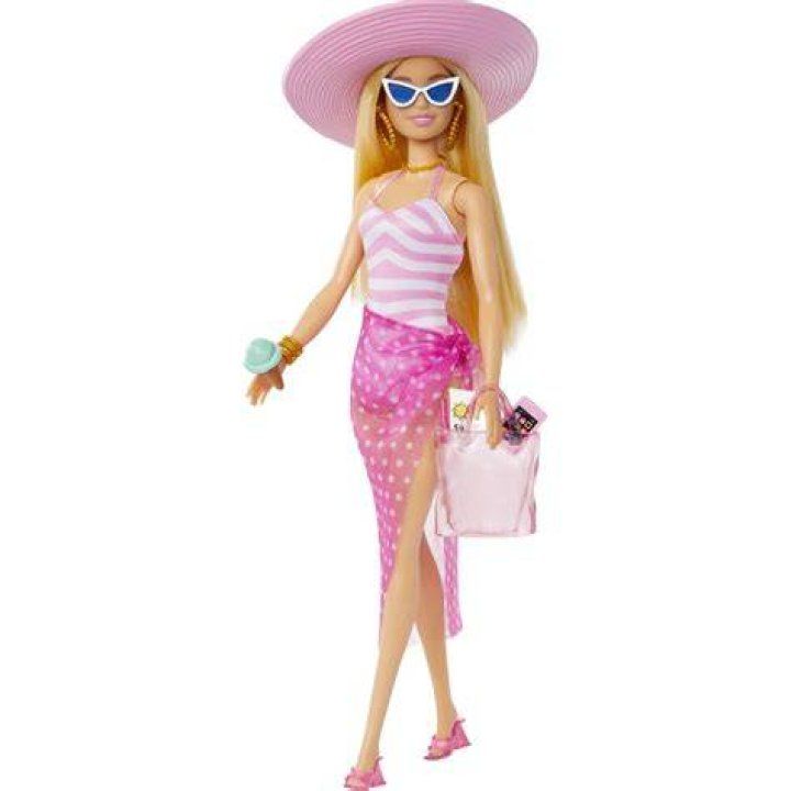 Unveil The Enchanting World Of Barbie Dolls At The Beach: A Journey Of Discovery