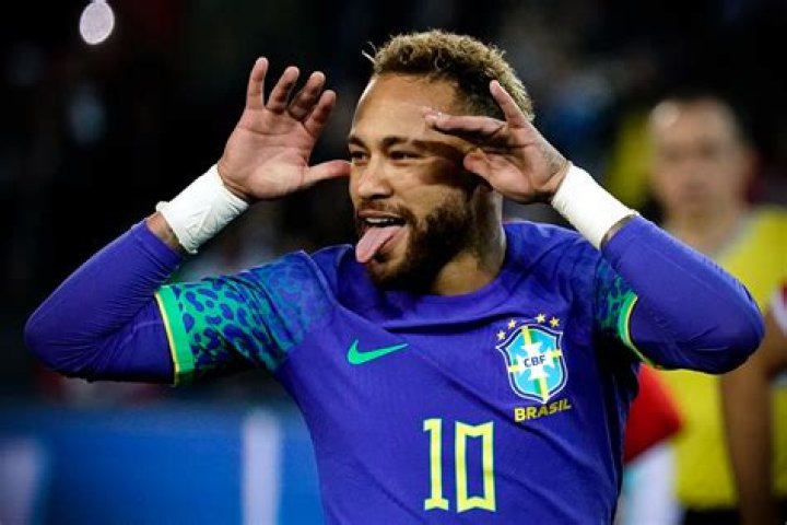 Why does Neymar put his hands on his head and poke out his tongue when